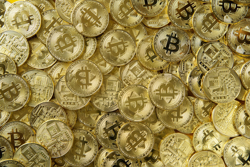Pile of gold bitcoin money